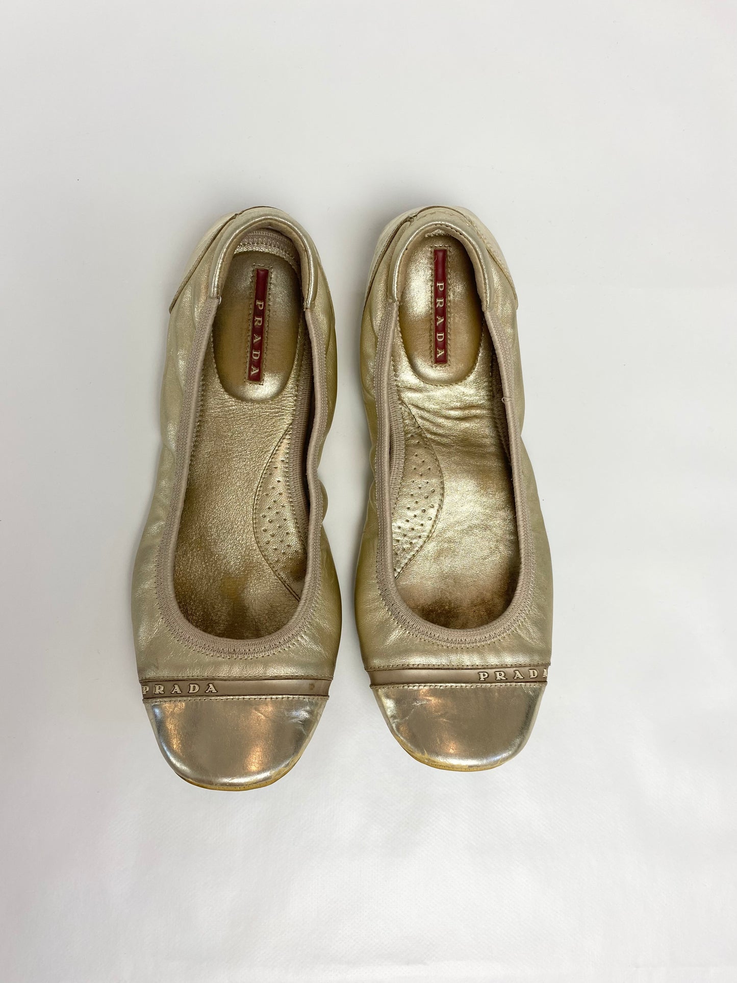 Prada Sport Gold Ballet Pumps